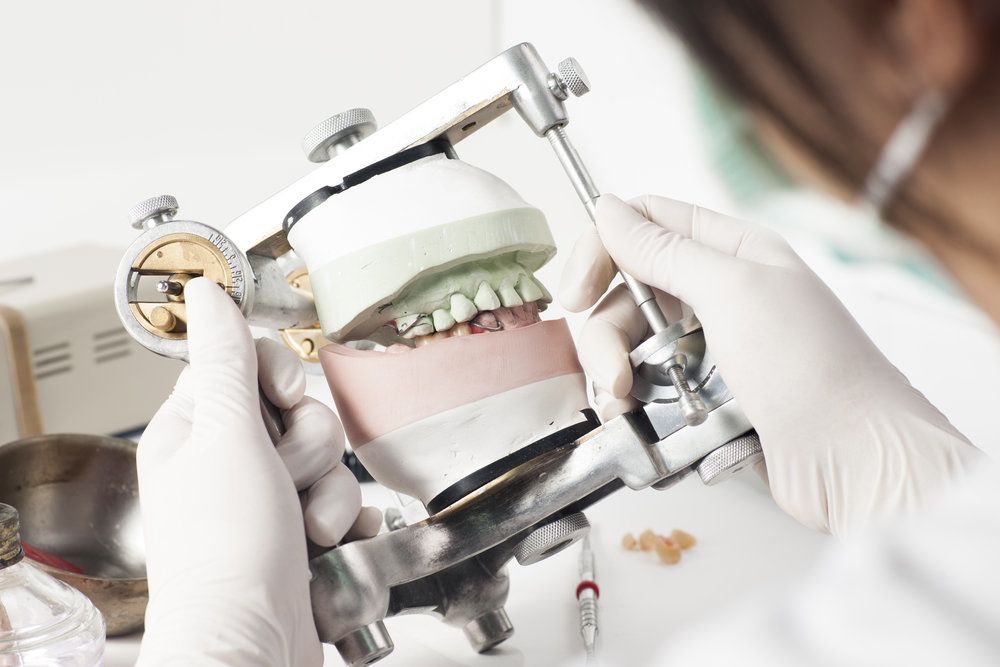 Lab technician creating dental mock-up